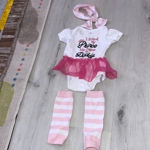 0-3 month skirt onsie. With matching leg warmers and bow